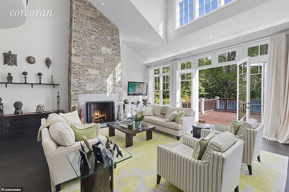 The 9,200-square-foot, seven-bedroom mansion, set on 3.9 acres, boasts a heated gunite pool and spa, a waterfall, and is within walking distance of both the local beach, restaurants and high-end shops in the village.